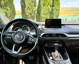 Mazda CX-9 2019 beschikbaar voor verhuur in Tbilisi, met een kilometerlimiet van onbeperkt.