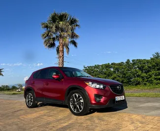 Vooraanzicht van een huurauto Mazda CX-5 in Tbilisi, Georgië ✓ Auto #14630. ✓ Transmissie Automatisch TM ✓ 0 beoordelingen.