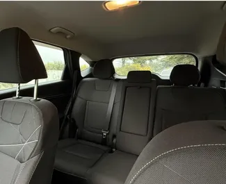 Interieur van Hyundai Tucson te huur in Georgië. Een geweldige auto met 5 zitplaatsen en een Automatisch transmissie.