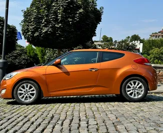 Verhuur Hyundai Veloster. Comfort Auto te huur in Georgië ✓ Borg van Zonder Borg ✓ Verzekeringsmogelijkheden TPL, CDW, SCDW, FDW, Passagiers, Diefstal.