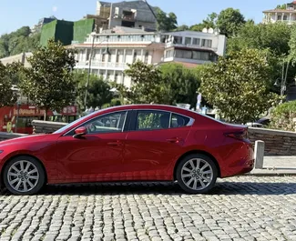 Verhuur Mazda 3. Economy, Comfort Auto te huur in Georgië ✓ Borg van Zonder Borg ✓ Verzekeringsmogelijkheden TPL, CDW, SCDW, FDW, Passagiers, Diefstal.