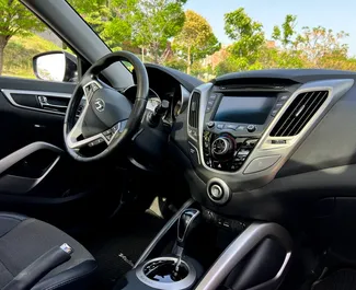 Verhuur Hyundai Veloster. Comfort Auto te huur in Georgië ✓ Borg van Zonder Borg ✓ Verzekeringsmogelijkheden TPL, CDW, SCDW, FDW, Passagiers, Diefstal.