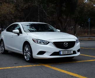 Vooraanzicht van een huurauto Mazda 6 in Tbilisi, Georgië ✓ Auto #14608. ✓ Transmissie Automatisch TM ✓ 0 beoordelingen.