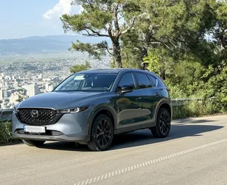 Vooraanzicht van een huurauto Mazda CX-5 in Tbilisi, Georgië ✓ Auto #14644. ✓ Transmissie Automatisch TM ✓ 0 beoordelingen.