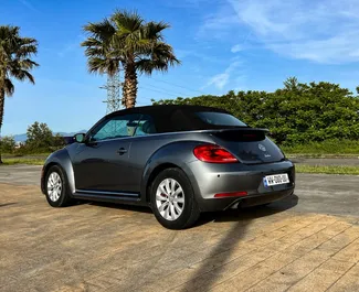 Volkswagen Beetle Cabrio 2015 beschikbaar voor verhuur in Tbilisi, met een kilometerlimiet van onbeperkt.