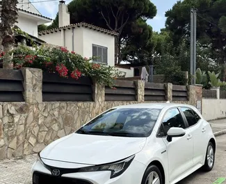 Vooraanzicht van een huurauto Toyota Corolla in Barcelona, Spanje ✓ Auto #10858. ✓ Transmissie Automatisch TM ✓ 1 beoordelingen.