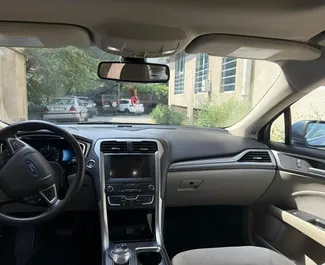 Ford Fusion Sedan 2019 beschikbaar voor verhuur in Tbilisi, met een kilometerlimiet van onbeperkt.