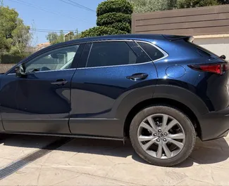 Verhuur Mazda CX-30. Economy, Comfort, Crossover Auto te huur in Spanje ✓ Borg van Borg van 500 EUR ✓ Verzekeringsmogelijkheden TPL.
