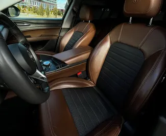 Verhuur Alfa Romeo Stelvio Quadrifoglio. Comfort, SUV, Crossover Auto te huur in Wit-Rusland ✓ Borg van Borg van 200 USD ✓ Verzekeringsmogelijkheden TPL, CDW.
