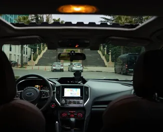 Interieur van Subaru Impreza te huur in Georgië. Een geweldige auto met 5 zitplaatsen en een Automatisch transmissie.
