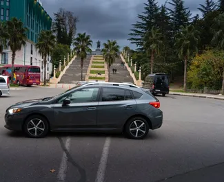 Vooraanzicht van een huurauto Subaru Impreza in Koetaisi, Georgië ✓ Auto #9343. ✓ Transmissie Automatisch TM ✓ 1 beoordelingen.