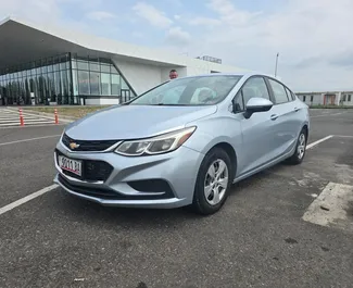 Vooraanzicht van een huurauto Chevrolet Cruze in Koetaisi, Georgië ✓ Auto #15120. ✓ Transmissie Automatisch TM ✓ 0 beoordelingen.