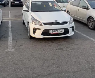 Vooraanzicht van een huurauto Kia Rio in Bakoe, Azerbeidzjan ✓ Auto #13505. ✓ Transmissie Automatisch TM ✓ 0 beoordelingen.