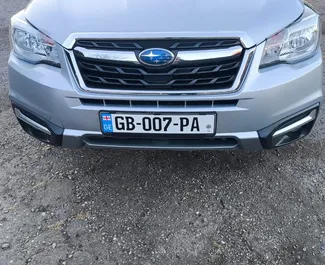 Vooraanzicht van een huurauto Subaru Forester in Koetaisi, Georgië ✓ Auto #15147. ✓ Transmissie Automatisch TM ✓ 0 beoordelingen.