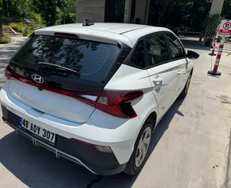 Autohuur Hyundai i20 2024 in in Turkije, met Benzine brandstof en 100 pk ➤ Vanaf 23 USD per dag.