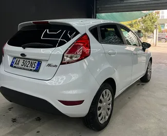 Ford Fiesta 2016 beschikbaar voor verhuur op de luchthaven van Tirana, met een kilometerlimiet van onbeperkt.