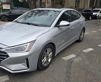 Vooraanzicht van een huurauto Hyundai Elantra in Tbilisi, Georgië ✓ Auto #15310. ✓ Transmissie Automatisch TM ✓ 0 beoordelingen.