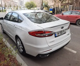 Autohuur Ford Fusion Sedan 2019 in in Georgië, met Hybride brandstof en 188 pk ➤ Vanaf 140 GEL per dag.