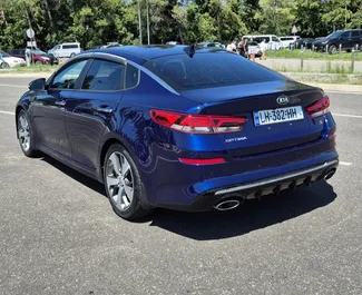 Verhuur Kia Optima. Comfort, Premium Auto te huur in Georgië ✓ Borg van Borg van 300 GEL ✓ Verzekeringsmogelijkheden TPL, SCDW, FDW, Passagiers, Diefstal, Jonge.