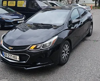 Vooraanzicht van een huurauto Chevrolet Cruze in Batumi, Georgië ✓ Auto #15515. ✓ Transmissie Automatisch TM ✓ 0 beoordelingen.