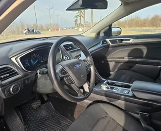 Verhuur Ford Fusion Sedan. Comfort, Premium Auto te huur in Georgië ✓ Borg van Zonder Borg ✓ Verzekeringsmogelijkheden TPL, CDW, Geen storting.