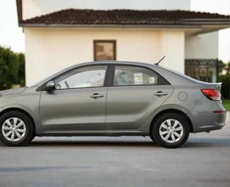 Verhuur Kia Pegas. Economy Auto te huur in de VAE ✓ Borg van Borg van 1000 AED ✓ Verzekeringsmogelijkheden TPL.