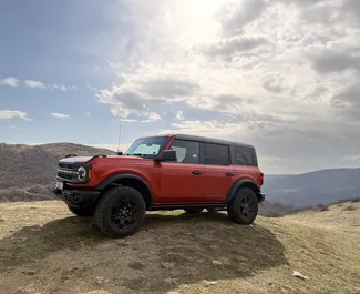 Vooraanzicht van een huurauto Ford Bronco in Tbilisi, Georgië ✓ Auto #15428. ✓ Transmissie Automatisch TM ✓ 0 beoordelingen.