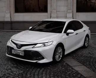 Vooraanzicht van een huurauto Toyota Camry in Almaty, Kazachstan ✓ Auto #15088. ✓ Transmissie Automatisch TM ✓ 0 beoordelingen.
