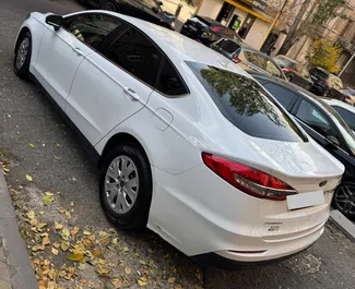 Autohuur Ford Fusion Sedan 2020 in in Armenië, met Benzine brandstof en 185 pk ➤ Vanaf 70 USD per dag.