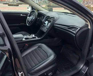Autohuur Ford Fusion Sedan 2017 in in Armenië, met Benzine brandstof en 175 pk ➤ Vanaf 35 USD per dag.