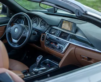 Interieur van BMW 428i Cabrio te huur in Montenegro. Een geweldige auto met 5 zitplaatsen en een Automatisch transmissie.