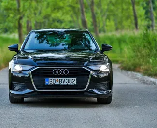 Vooraanzicht van een huurauto Audi A6 in Becici, Montenegro ✓ Auto #12159. ✓ Transmissie Automatisch TM ✓ 0 beoordelingen.
