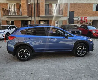 Vooraanzicht van een huurauto Subaru Crosstrek in Tbilisi, Georgië ✓ Auto #15714. ✓ Transmissie Automatisch TM ✓ 0 beoordelingen.