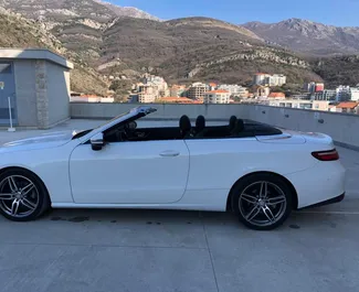 Mercedes-Benz E-Class Cabrio 2019 beschikbaar voor verhuur in Becici, met een kilometerlimiet van onbeperkt.