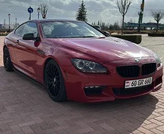 Vooraanzicht van een huurauto BMW 6-series Coupe op de luchthaven van Yerevan, Armenië ✓ Auto #15855. ✓ Transmissie Automatisch TM ✓ 0 beoordelingen.