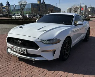 Vooraanzicht van een huurauto Ford Mustang Coupe op de luchthaven van Yerevan, Armenië ✓ Auto #15854. ✓ Transmissie Automatisch TM ✓ 0 beoordelingen.