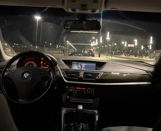 BMW X1 2013 beschikbaar voor verhuur in Tirana, met een kilometerlimiet van onbeperkt.
