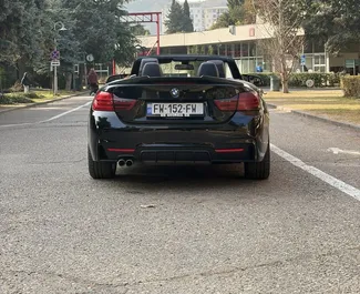 BMW 428i Cabrio 2015 beschikbaar voor verhuur in Tbilisi, met een kilometerlimiet van onbeperkt.