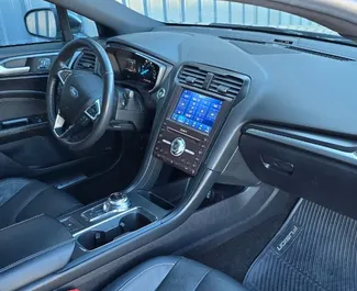 Ford Fusion Sedan 2020 beschikbaar voor verhuur in Tbilisi, met een kilometerlimiet van onbeperkt.