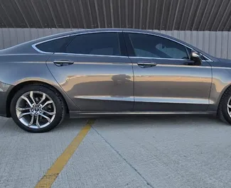 Autohuur Ford Fusion Sedan 2020 in in Georgië, met Hybride brandstof en 180 pk ➤ Vanaf 75 GEL per dag.