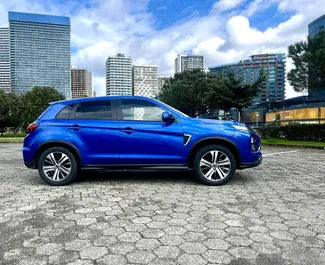 Vooraanzicht van een huurauto Mitsubishi Outlander Sport in Batumi, Georgië ✓ Auto #15733. ✓ Transmissie Automatisch TM ✓ 0 beoordelingen.