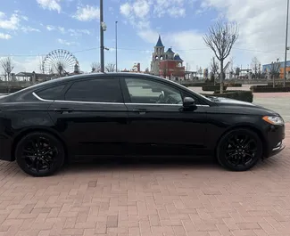Verhuur Ford Fusion Sedan. Comfort Auto te huur in Armenië ✓ Borg van Borg van 190 USD ✓ Verzekeringsmogelijkheden TPL, CDW, SCDW, FDW, Passagiers, Diefstal, Buitenland, Jonge, Geen storting.