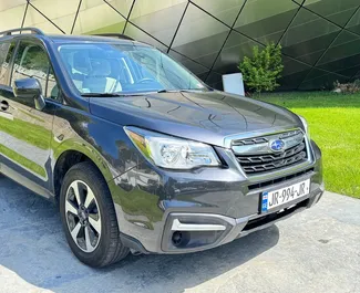 Vooraanzicht van een huurauto Subaru Forester in Tbilisi, Georgië ✓ Auto #15698. ✓ Transmissie Automatisch TM ✓ 0 beoordelingen.