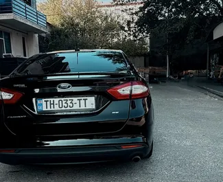 Verhuur Ford Fusion Sedan. Comfort, Premium Auto te huur in Georgië ✓ Borg van Borg van 200 GEL ✓ Verzekeringsmogelijkheden TPL, CDW, SCDW, Passagiers, Diefstal, Geen storting.