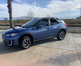 Vooraanzicht van een huurauto Subaru Crosstrek in Batumi, Georgië ✓ Auto #15734. ✓ Transmissie Automatisch TM ✓ 0 beoordelingen.