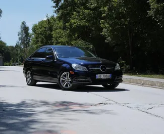 Vooraanzicht van een huurauto Mercedes-Benz C-Class in Tirana, Albanië ✓ Auto #10549. ✓ Transmissie Automatisch TM ✓ 0 beoordelingen.