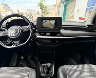 Verhuur Suzuki Swift. Economy Auto te huur in Tunesië ✓ Borg van Borg van 700 EUR ✓ Verzekeringsmogelijkheden TPL.