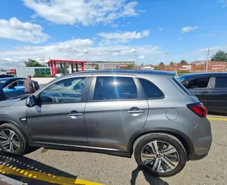 Interieur van Mitsubishi Outlander Sport te huur in Georgië. Een geweldige auto met 5 zitplaatsen en een Automatisch transmissie.