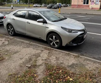 Vooraanzicht van een huurauto Toyota Corolla Sedan in Minsk, Wit-Rusland ✓ Auto #15797. ✓ Transmissie Automatisch TM ✓ 0 beoordelingen.