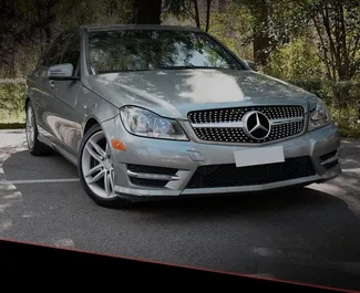 Vooraanzicht van een huurauto Mercedes-Benz C-Class in Tirana, Albanië ✓ Auto #10507. ✓ Transmissie Automatisch TM ✓ 0 beoordelingen.